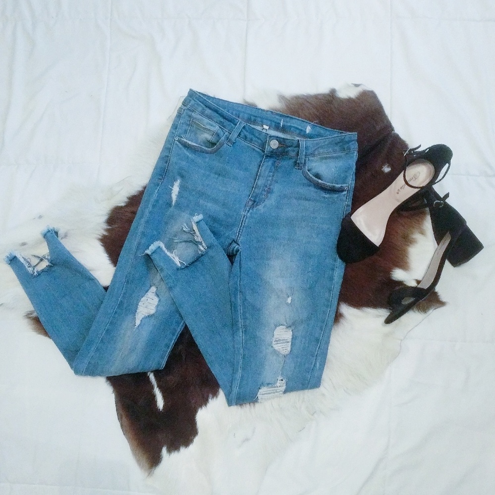 Destroyed Medium-Wash Denim Jeans